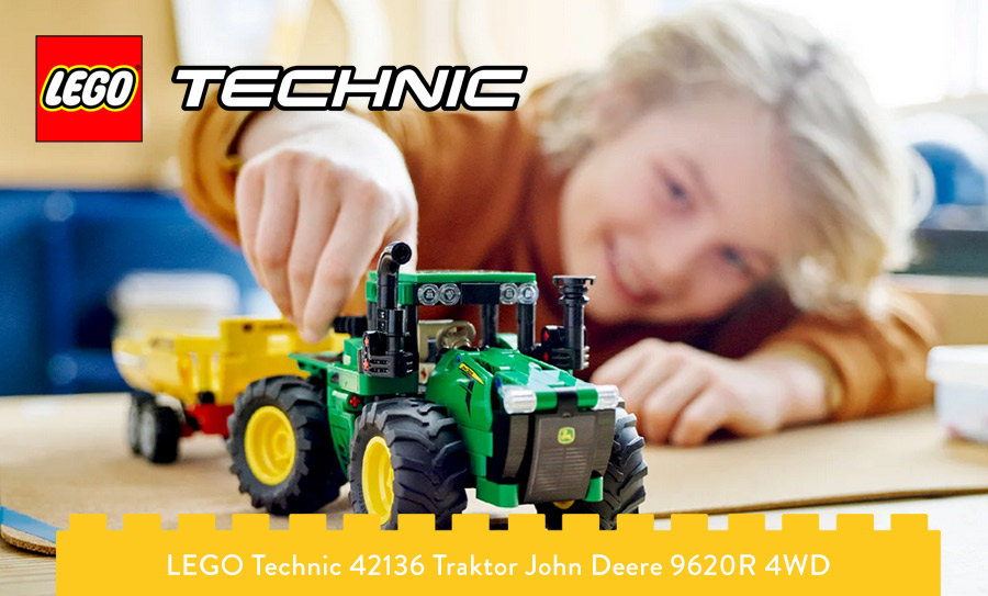 chłopiec bawiący sie traktorem LEGO